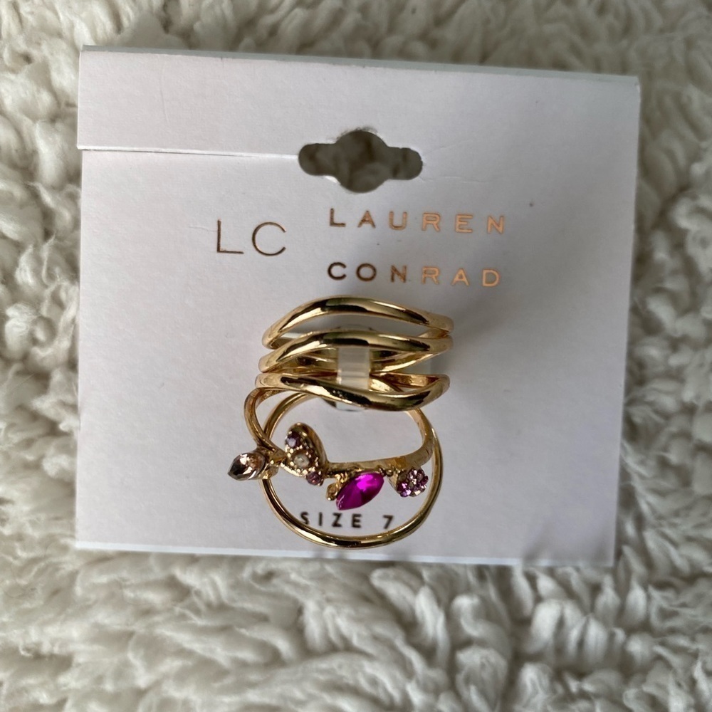 NWT LC Lauren Conrad Rose Gold Tone
Clear Simulated Stones & Wavy Bands Ring Set - Picture 3 of 4